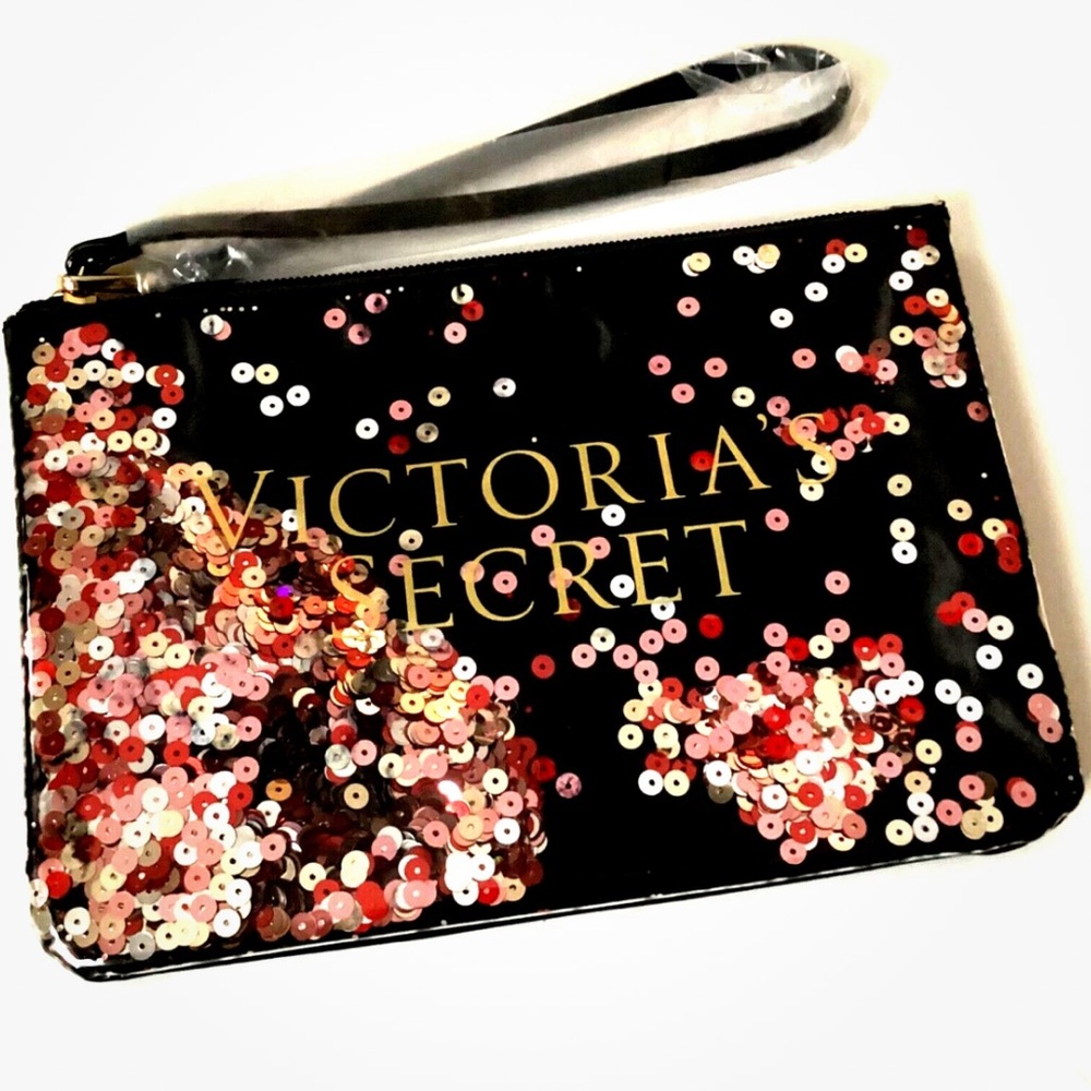 Victorias Secret wristlet accessory bag. Floating sequence